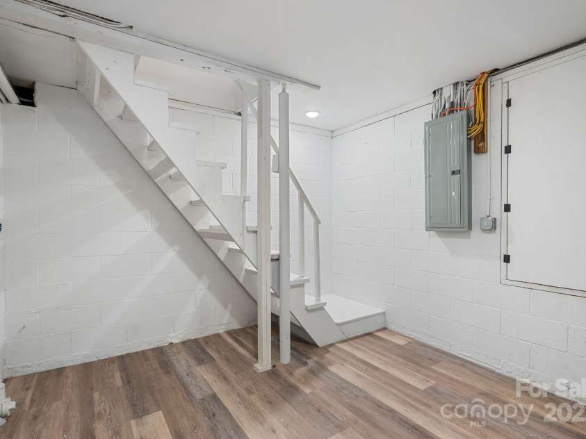 11 Upland Road, Asheville, NC 28804.  MLS# CAR4276545, YatesRealty ID 26522. Steps from the Main Level to Basement