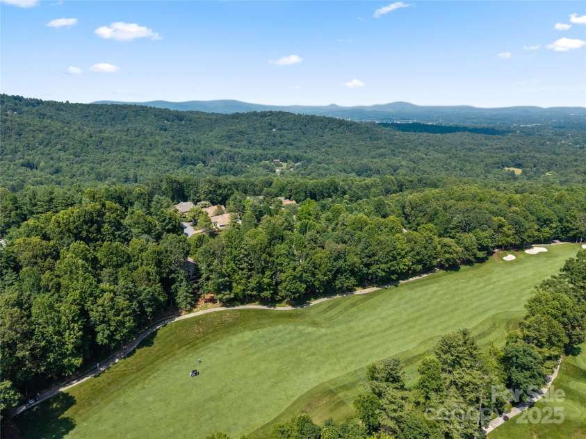 196 Pine Shadow Drive, Hendersonville, NC 28739.  MLS# CAR4274767, YatesRealty ID 26527. 3rd hole of the course