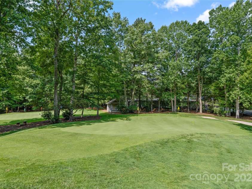 196 Pine Shadow Drive, Hendersonville, NC 28739.  MLS# CAR4274767, YatesRealty ID 26527. Approximately 1000 ft from the Short Game Practice Range