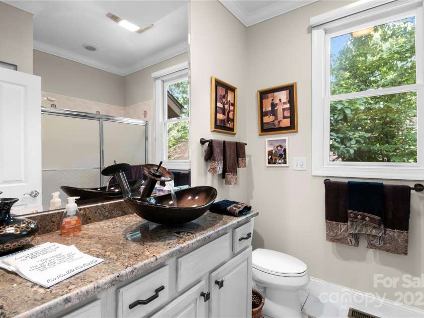 196 Pine Shadow Drive, Hendersonville, NC 28739.  MLS# CAR4274767, YatesRealty ID 26527. Guest bath beside the office