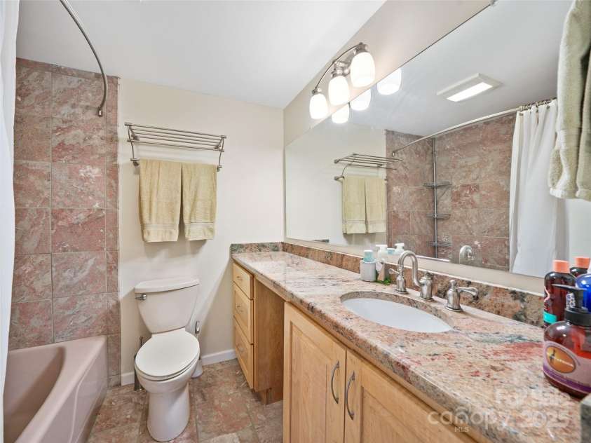 19 Old Patton Hill Road, Swannanoa, NC 28778.  MLS# CAR4246473, YatesRealty ID 26529. Bath 2 lower level.