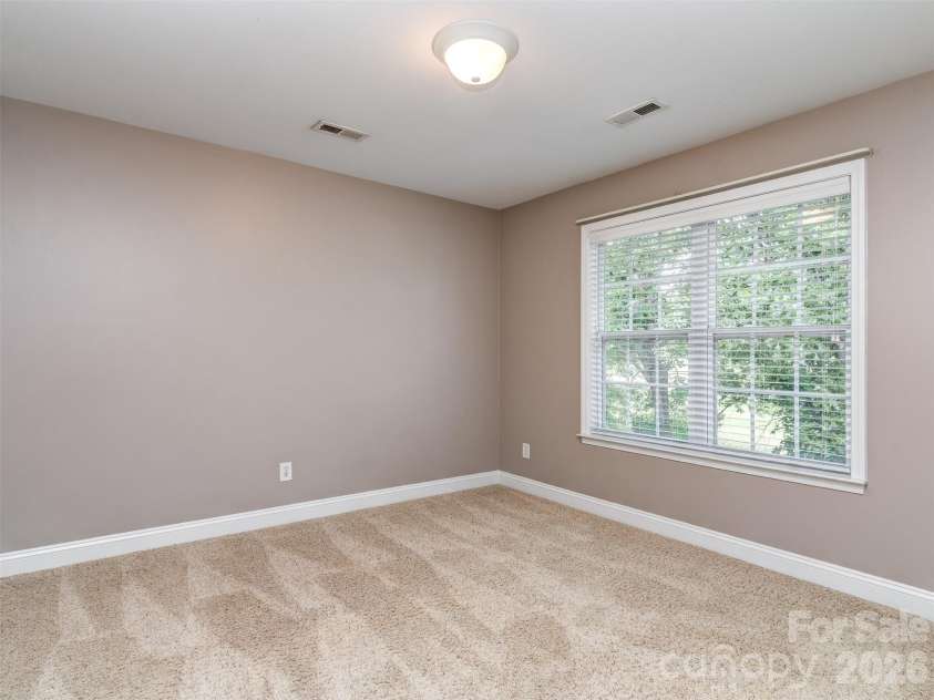 6167 Four Wood Drive, Matthews, NC 28104.  MLS# CAR4383205, YatesRealty ID 26529. 2nd Floor Bedroom