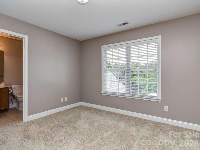 6167 Four Wood Drive, Matthews, NC 28104.  MLS# CAR4383205, YatesRealty ID 26529. 2nd Floor Bedroom