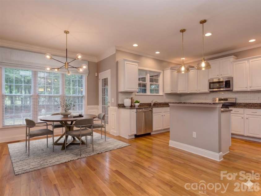 6167 Four Wood Drive, Matthews, NC 28104.  MLS# CAR4383205, YatesRealty ID 26529. Breakfast Area Virtually Staged