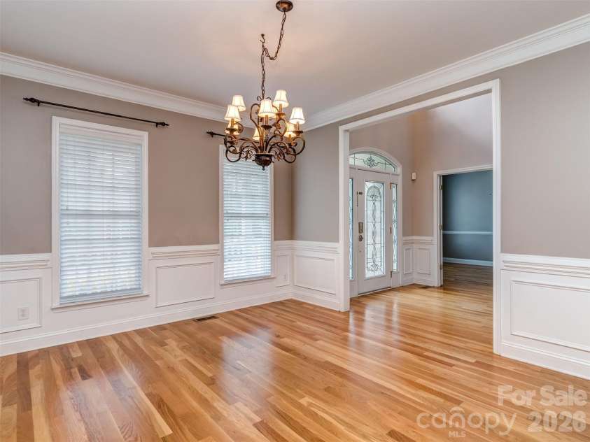 6167 Four Wood Drive, Matthews, NC 28104.  MLS# CAR4383205, YatesRealty ID 26529. Great Room Virtually Staged