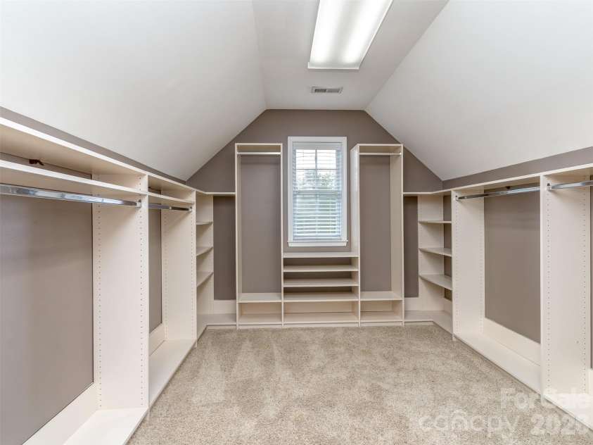 6167 Four Wood Drive, Matthews, NC 28104.  MLS# CAR4383205, YatesRealty ID 26529. HUGE Primary Closet