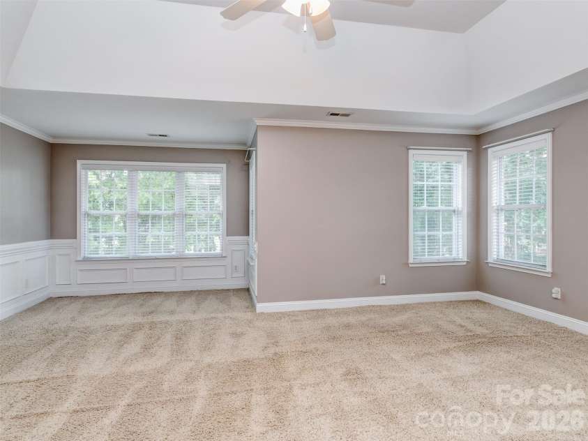 6167 Four Wood Drive, Matthews, NC 28104.  MLS# CAR4383205, YatesRealty ID 26529. Primary Bedroom