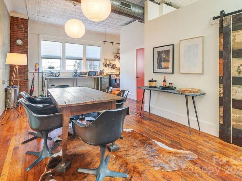 33 Carolina Lane, Asheville, NC 28801.  MLS# CAR4277865, YatesRealty ID 26531. A barn door style entryway to the designated 