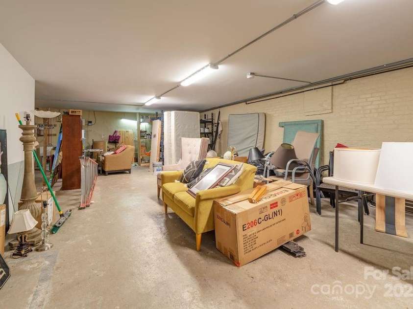 33 Carolina Lane, Asheville, NC 28801.  MLS# CAR4277865, YatesRealty ID 26531. Partially finished basement, TONS of storage