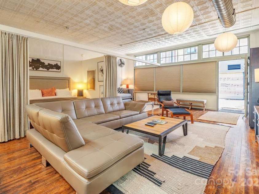 33 Carolina Lane, Asheville, NC 28801.  MLS# CAR4277865, YatesRealty ID 26531. Room for oversized furniture, and beautiful hardwoods throughout.