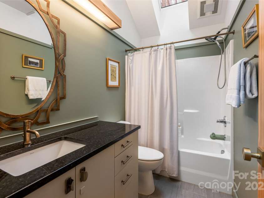 111 Bilberry Lane, Candler, NC 28715.  MLS# CAR4280132, YatesRealty ID 26532. Guest Bath
