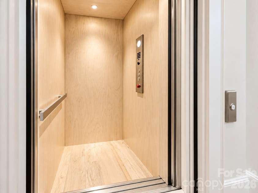 401 McDonald Avenue, Charlotte, NC 28203.  MLS# CAR4385467, YatesRealty ID 26533. Elevator