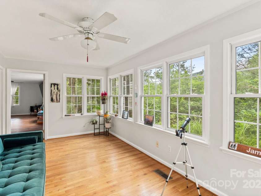 32 Tucker Road, Black Mountain, NC 28711.  MLS# CAR4275444, YatesRealty ID 26535. 4 season sunroom/flex space off of primary