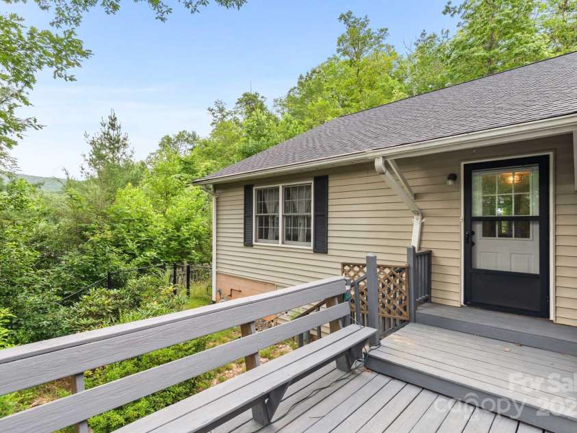 32 Tucker Road, Black Mountain, NC 28711.  MLS# CAR4275444, YatesRealty ID 26535. Living room entry with mountain scape