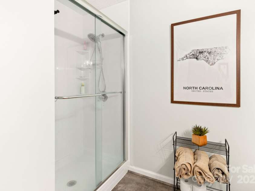 32 Tucker Road, Black Mountain, NC 28711.  MLS# CAR4275444, YatesRealty ID 26535. Primary bathroom