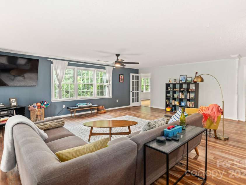 32 Tucker Road, Black Mountain, NC 28711.  MLS# CAR4275444, YatesRealty ID 26535. Spacious light filled living room