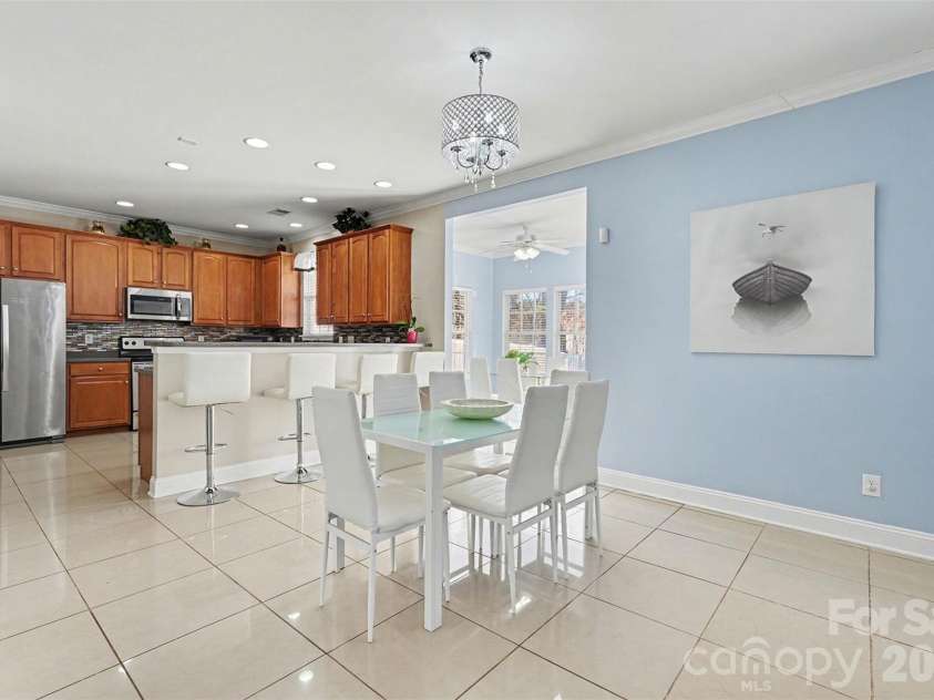 11001 Dulin Creek Boulevard, Charlotte, NC 28215.  MLS# CAR4287097, YatesRealty ID 26536. Dining Room & Kitchen