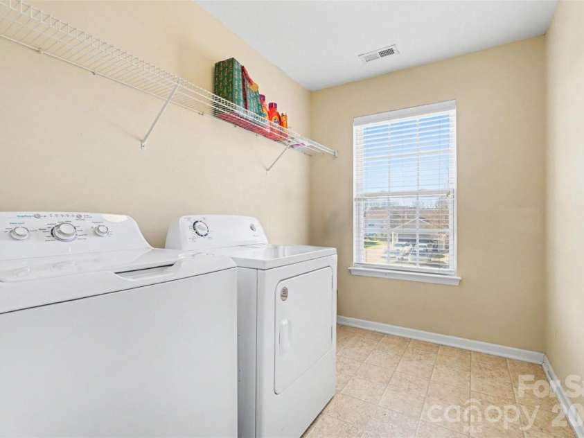 11001 Dulin Creek Boulevard, Charlotte, NC 28215.  MLS# CAR4287097, YatesRealty ID 26536. Laundry Room