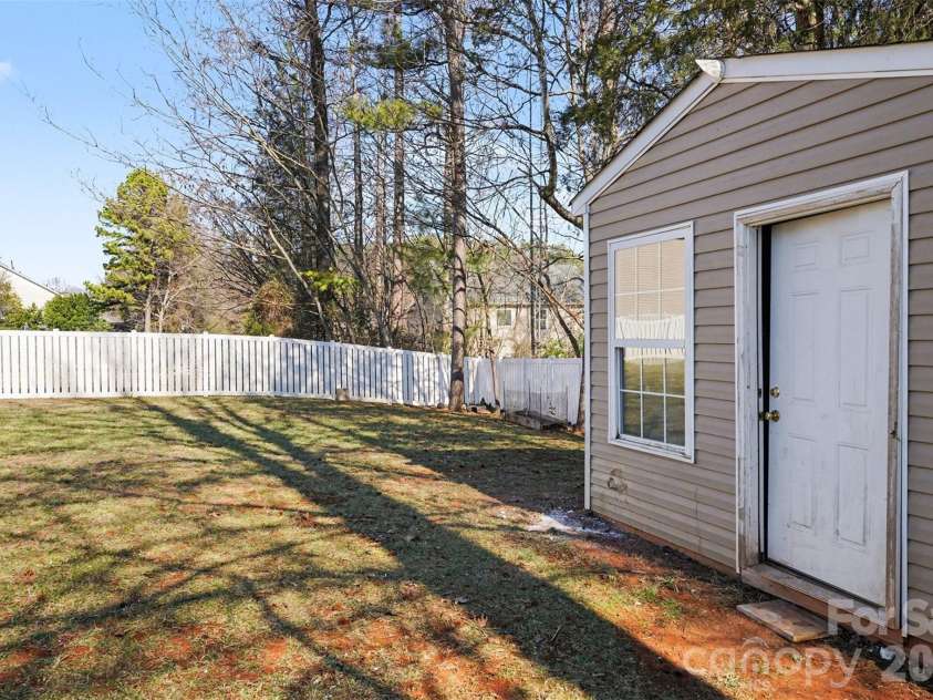 11001 Dulin Creek Boulevard, Charlotte, NC 28215.  MLS# CAR4287097, YatesRealty ID 26536. Storage Shed
