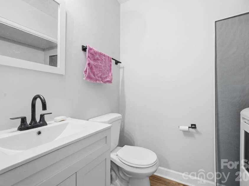 5918 Crape Myrtle Lane, Charlotte, NC 28216.  MLS# CAR4326062, YatesRealty ID 26538. Main Level Half Bath