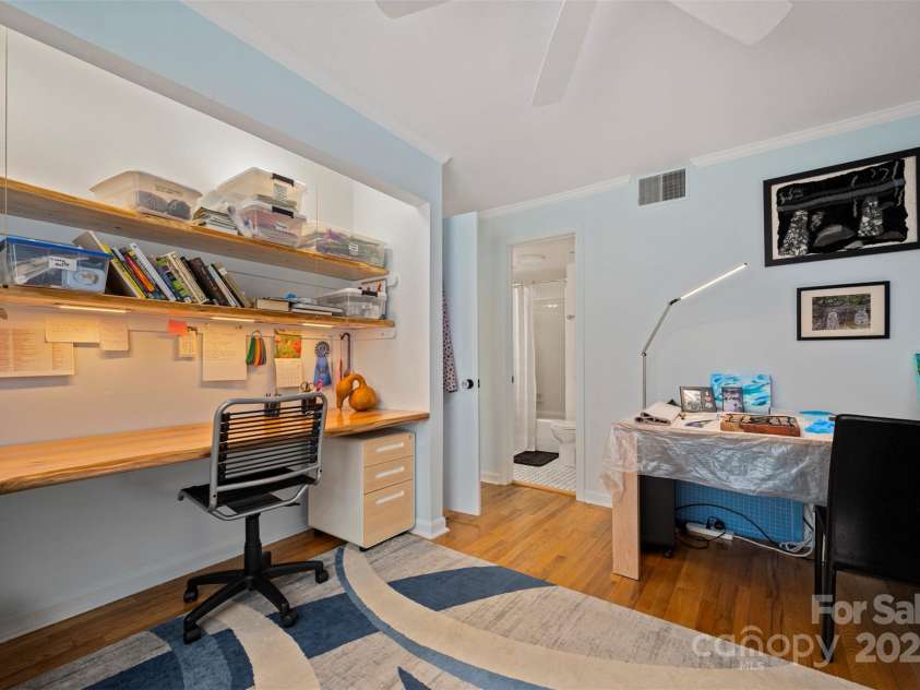 305 Grady Avenue, Tryon, NC 28782.  MLS# CAR4233461, YatesRealty ID 2654. Guest Bedroom with Custom Desk