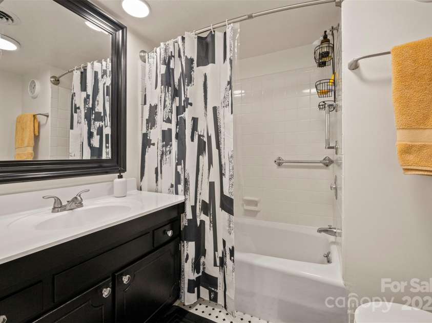 305 Grady Avenue, Tryon, NC 28782.  MLS# CAR4233461, YatesRealty ID 2654. Primary Bath