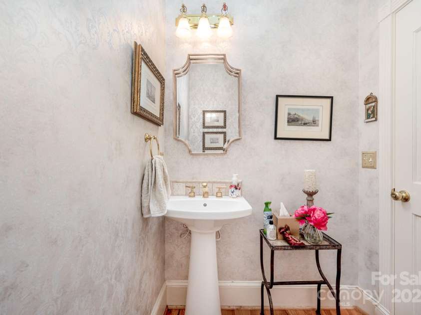 408 Johnsfield Road, Shelby, NC 28150.  MLS# CAR4269402, YatesRealty ID 26543. Elegant half bath on the main floor