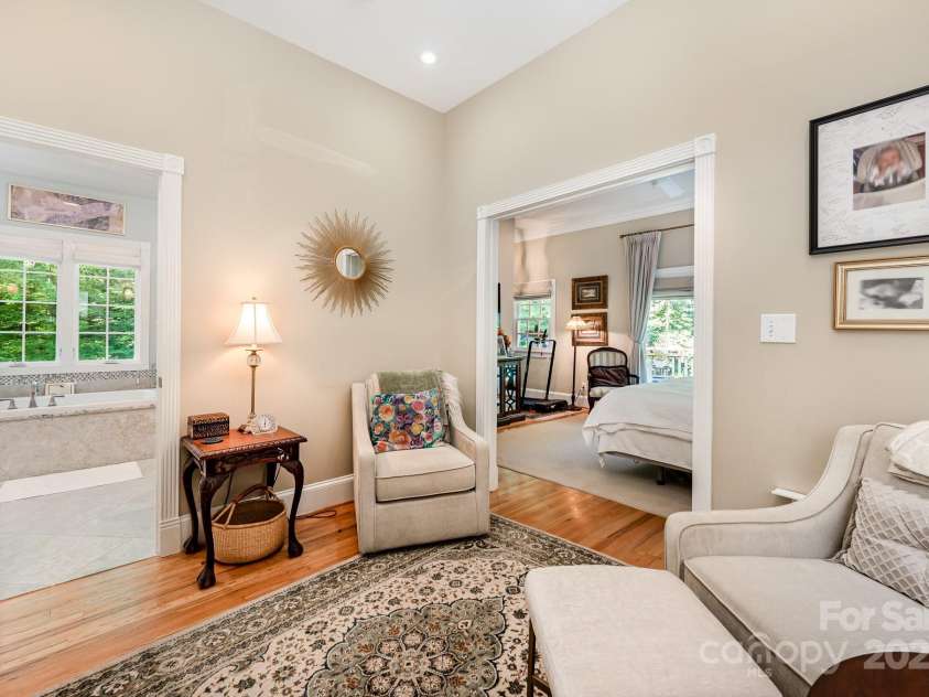 408 Johnsfield Road, Shelby, NC 28150.  MLS# CAR4269402, YatesRealty ID 26543. There is a spacious sitting room as you enter the primary suite on the main floor.