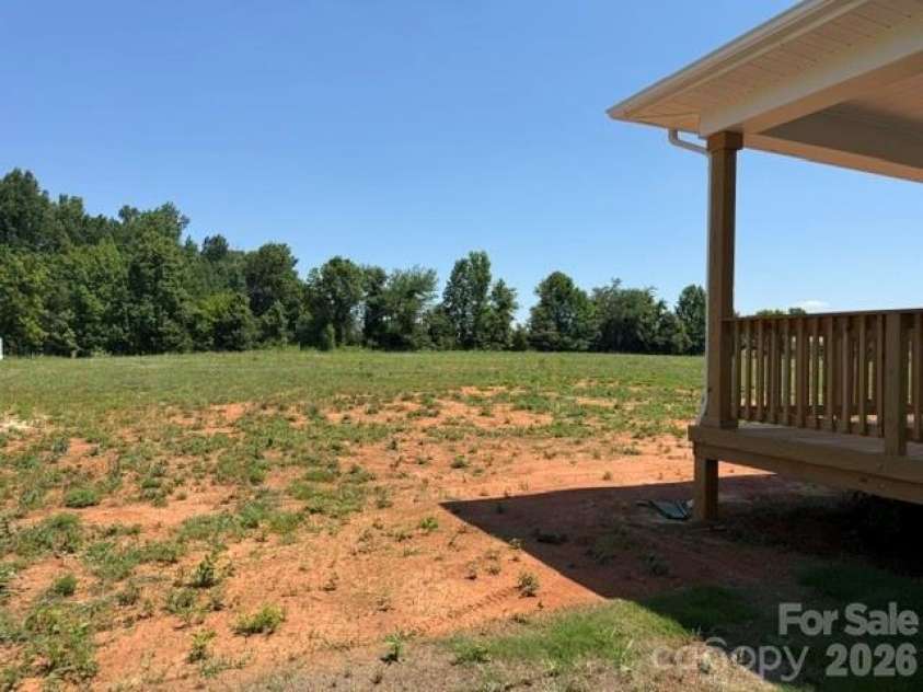 1250 Gardenia Drive, Mt Ulla, NC 28125.  MLS# CAR4365465, YatesRealty ID 26547. .96 Acres!