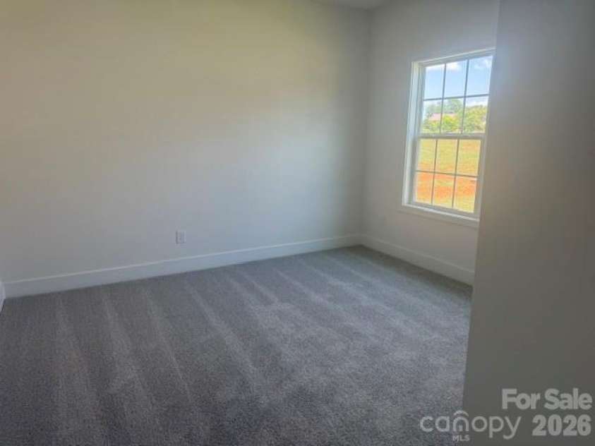 1250 Gardenia Drive, Mt Ulla, NC 28125.  MLS# CAR4365465, YatesRealty ID 26547. Bedroom 2 on main level