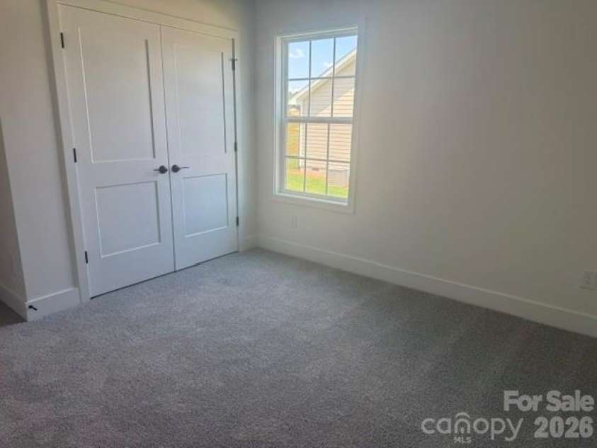1250 Gardenia Drive, Mt Ulla, NC 28125.  MLS# CAR4365465, YatesRealty ID 26547. Bedroom 3 on main level