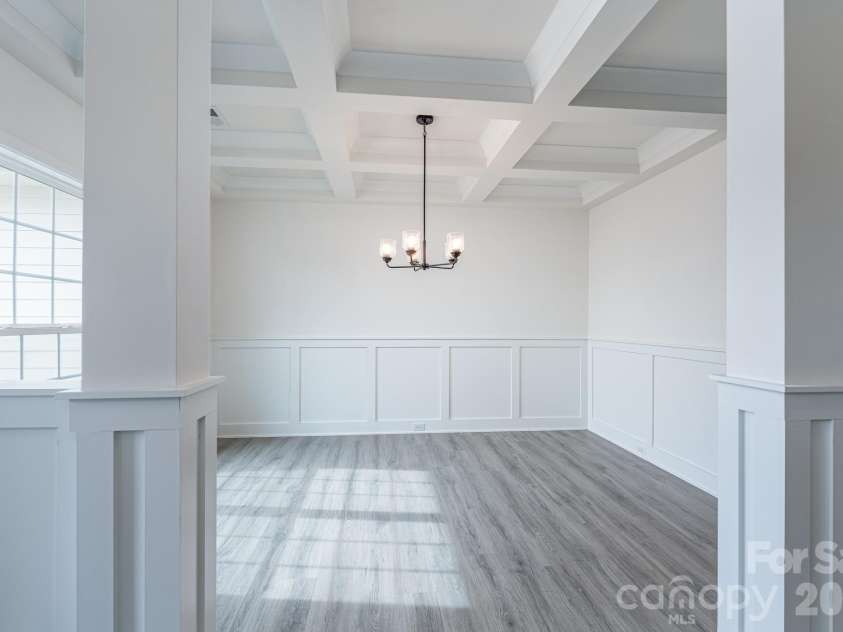 1250 Gardenia Drive, Mt Ulla, NC 28125.  MLS# CAR4365465, YatesRealty ID 26547. Dining Room with coffered ceilings