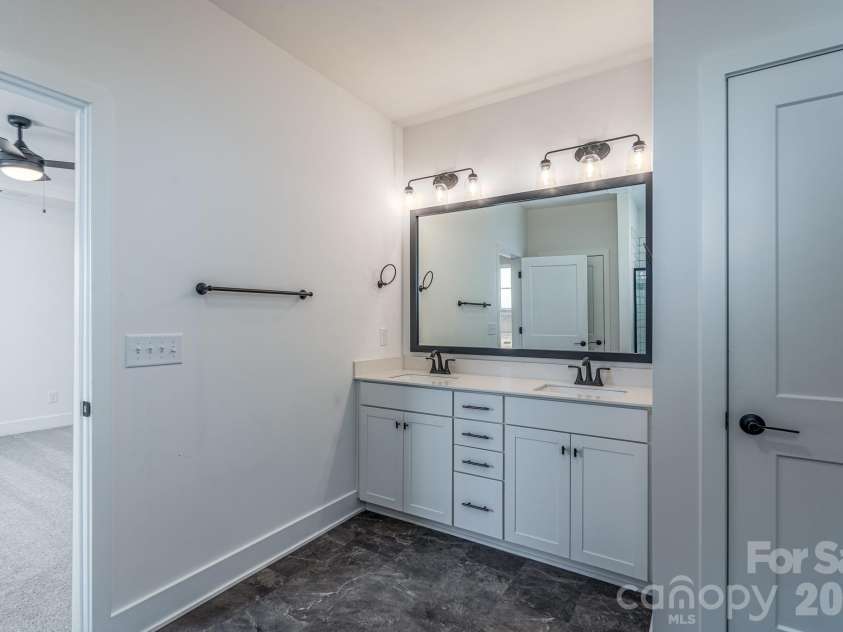 1250 Gardenia Drive, Mt Ulla, NC 28125.  MLS# CAR4365465, YatesRealty ID 26547. Double sinks in primary bath