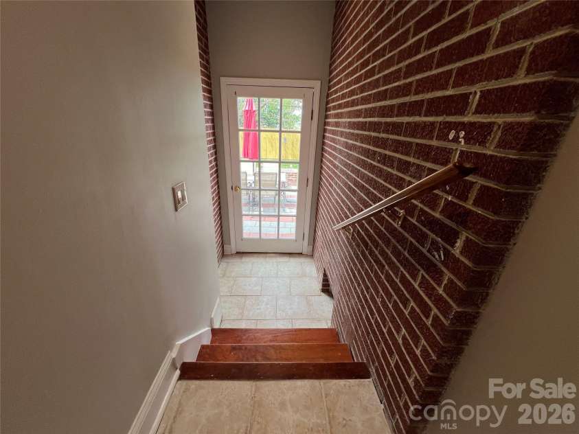 93 Laycock Road, Hendersonville, NC 28792.  MLS# CAR4367068, YatesRealty ID 26548. Going out back