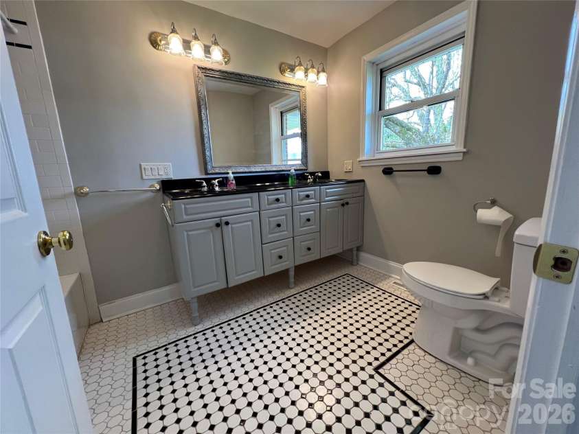 93 Laycock Road, Hendersonville, NC 28792.  MLS# CAR4367068, YatesRealty ID 26548. Guest bath.