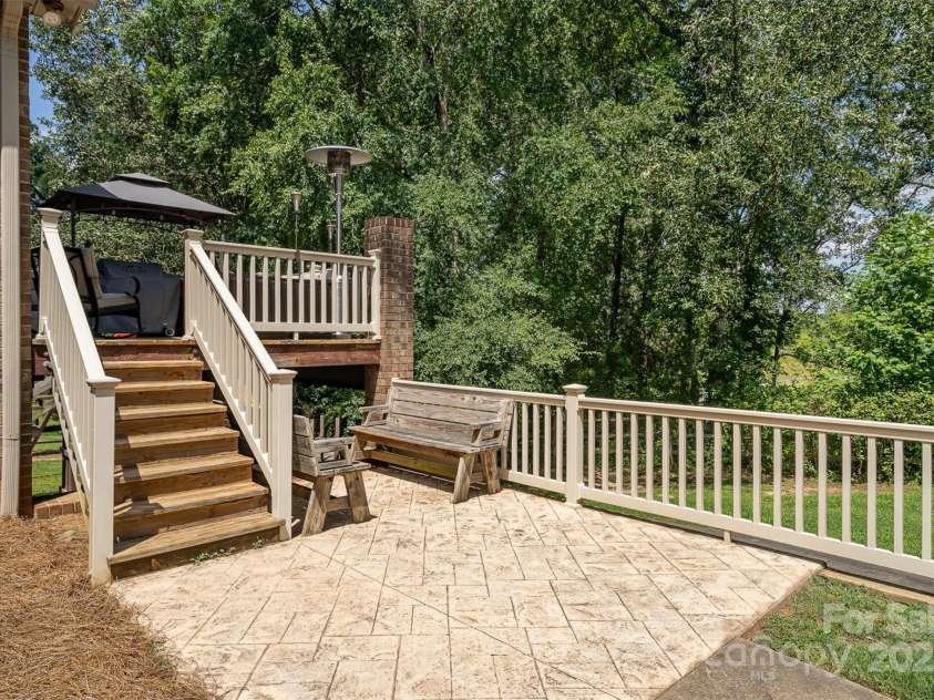 135 Oak Creek Drive, Rockwell, NC 28138.  MLS# CAR4269550, YatesRealty ID 26550. Backyard deck