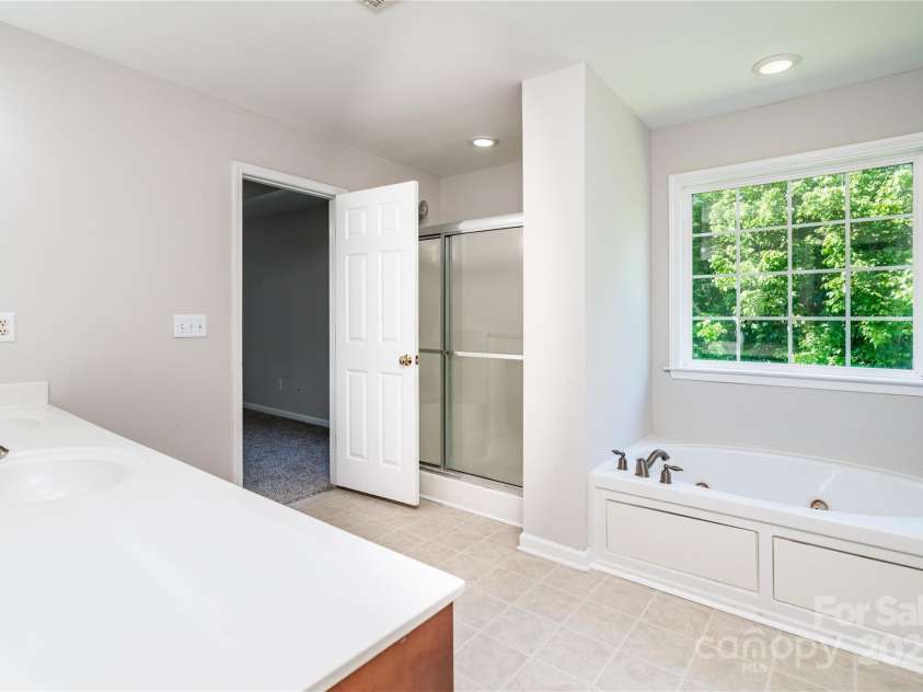 119 Tilton Drive, Mooresville, NC 28115.  MLS# CAR4274141, YatesRealty ID 26551. Primary bathroom alt angle