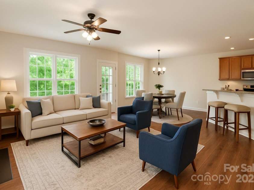 119 Tilton Drive, Mooresville, NC 28115.  MLS# CAR4274141, YatesRealty ID 26551. Virtually staged living/dining area