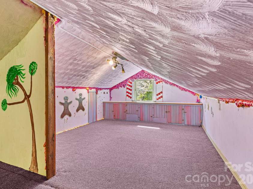 114 Walker Street, Black Mountain, NC 28711.  MLS# CAR4367539, YatesRealty ID 26552. Attic Loft with Built-In Cabinets
