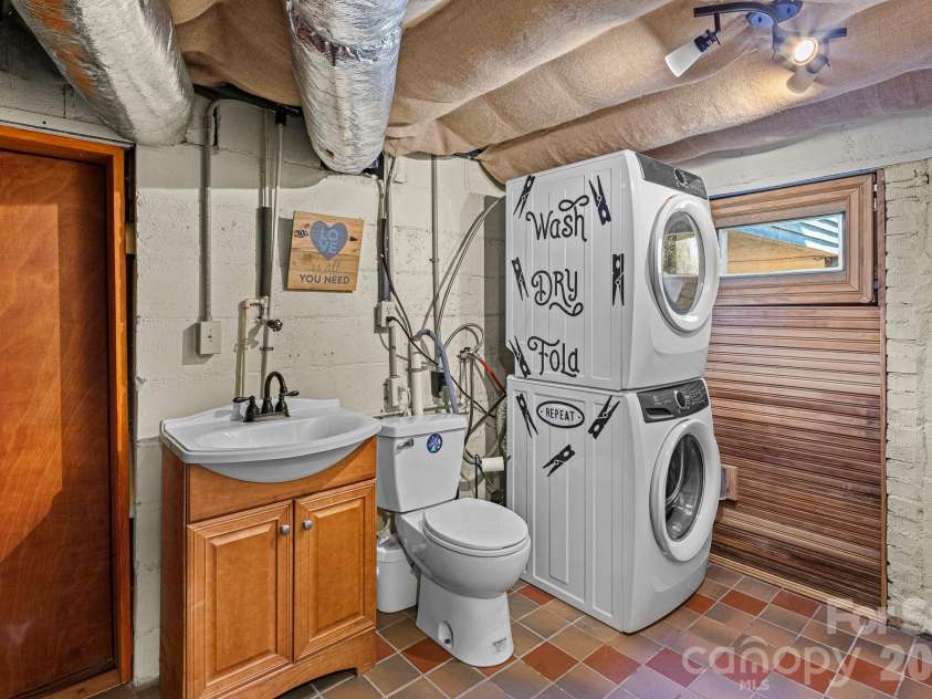 114 Walker Street, Black Mountain, NC 28711.  MLS# CAR4367539, YatesRealty ID 26552. Basement Half Bath and Laundry Area
