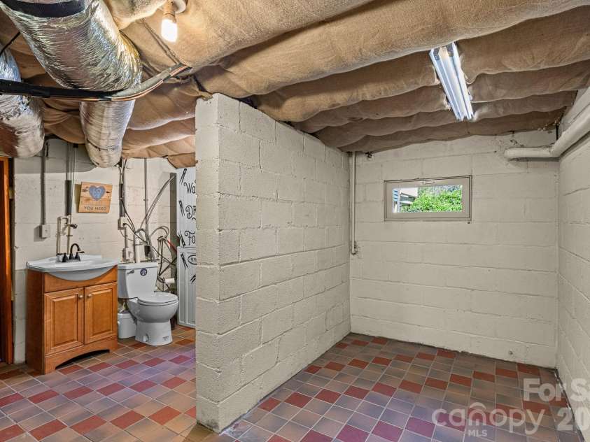 114 Walker Street, Black Mountain, NC 28711.  MLS# CAR4367539, YatesRealty ID 26552. Extra Basement Storage
