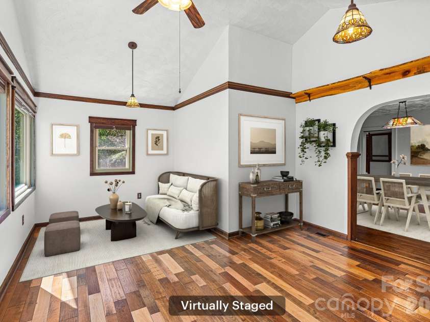 114 Walker Street, Black Mountain, NC 28711.  MLS# CAR4367539, YatesRealty ID 26552. Virtually-Staged Sunroom looking into Dining Room