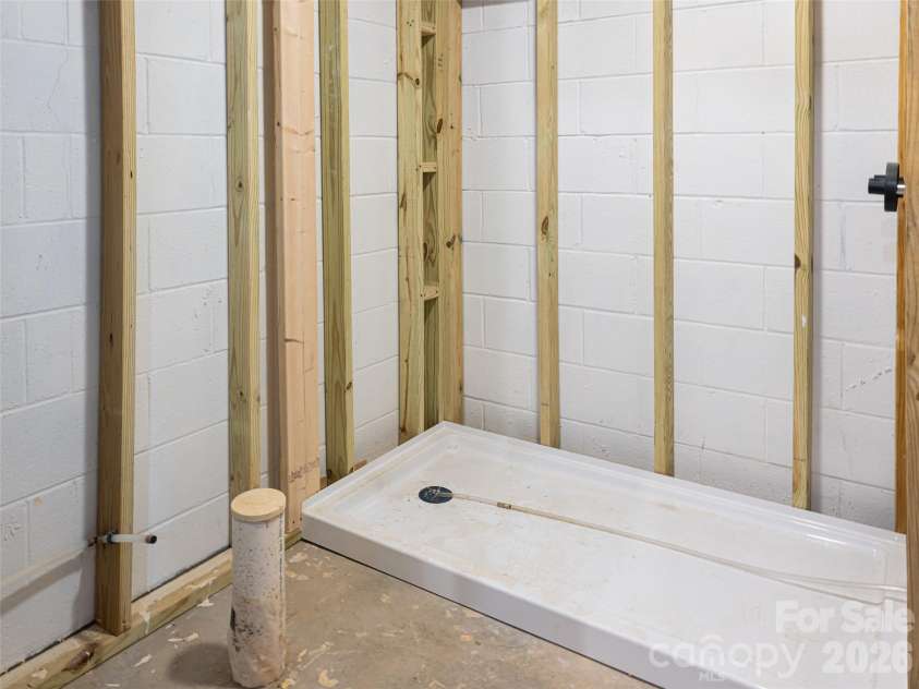 17 Dreambird Drive, Leicester, NC 28748.  MLS# CAR4370308, YatesRealty ID 26554. Basement bath plumbed