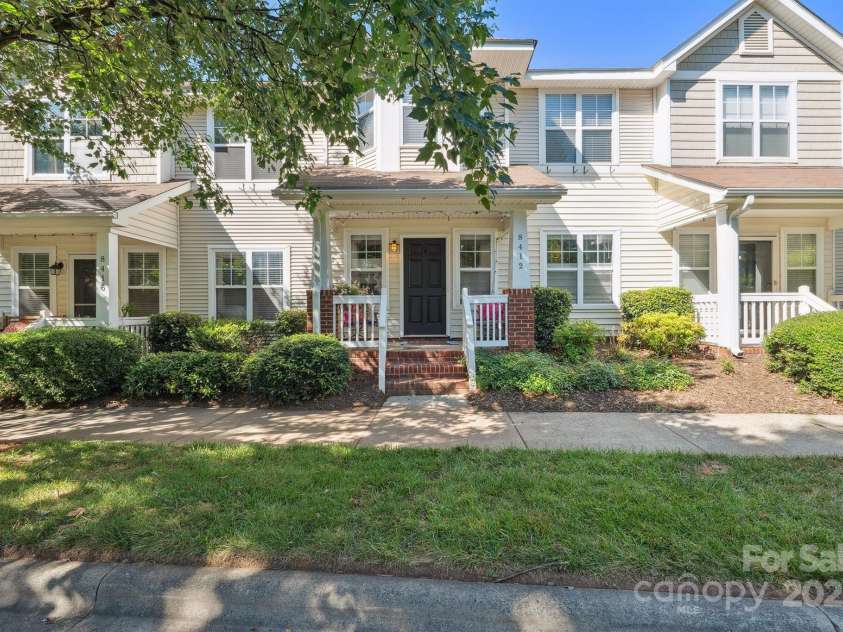 8412 Townley Road, Huntersville, NC 28078.  MLS# CAR4281969, YatesRealty ID 26554. Inviting Rocking Chair Front Porch.