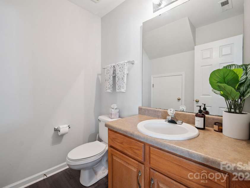 8412 Townley Road, Huntersville, NC 28078.  MLS# CAR4281969, YatesRealty ID 26554. Powder Room with Luxury Vinyl Plank.