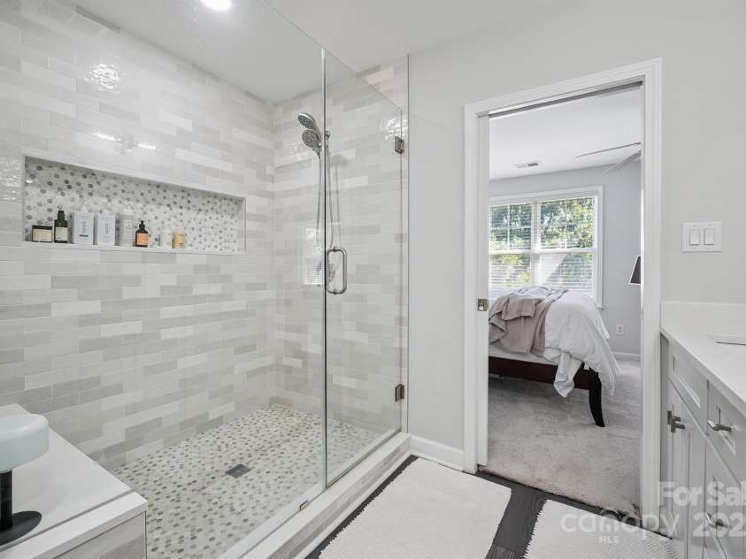 8412 Townley Road, Huntersville, NC 28078.  MLS# CAR4281969, YatesRealty ID 26554. Spa-Worthy Walk-In Shower with Frameless Glass.