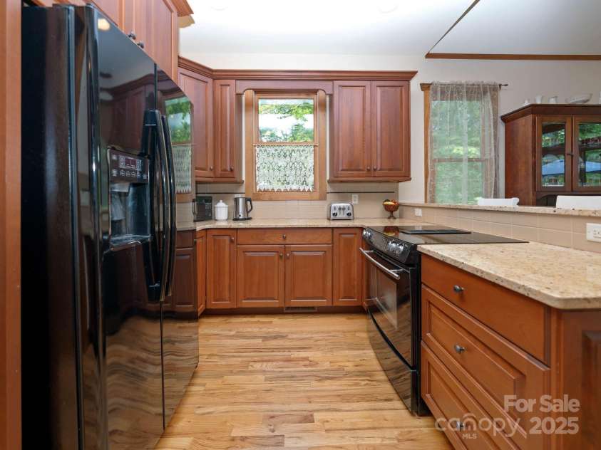 219 Hiwassee Road, Lake Toxaway, NC 28747.  MLS# CAR4264723, YatesRealty ID 26555. 