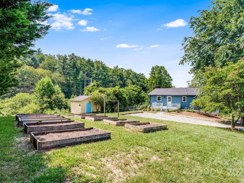 1360 Jupiter Road, Weaverville, NC 28787.  MLS# CAR4276296, YatesRealty ID 26556. 10 Raised Garden Beds