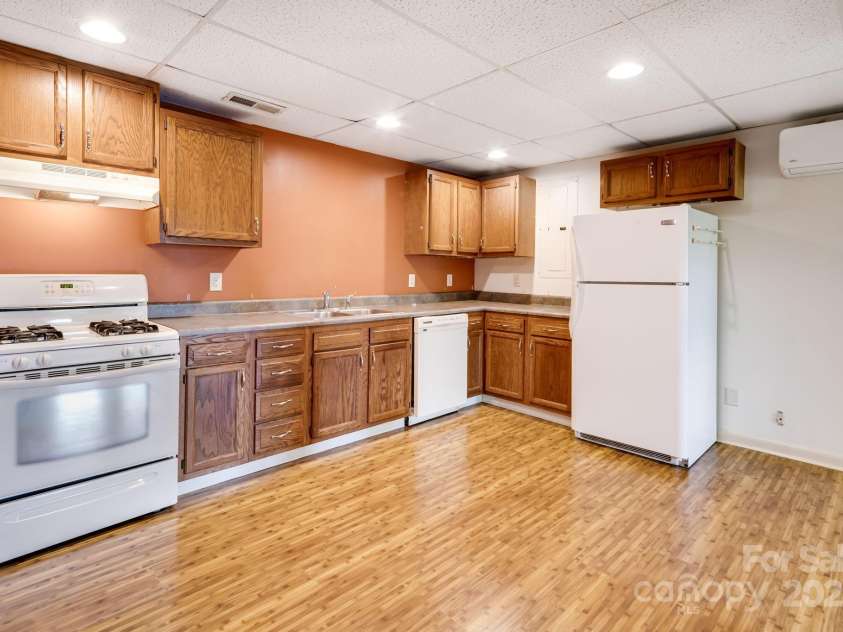 1360 Jupiter Road, Weaverville, NC 28787.  MLS# CAR4276296, YatesRealty ID 26556. Basement Apartment Open Kitchen and Living Space