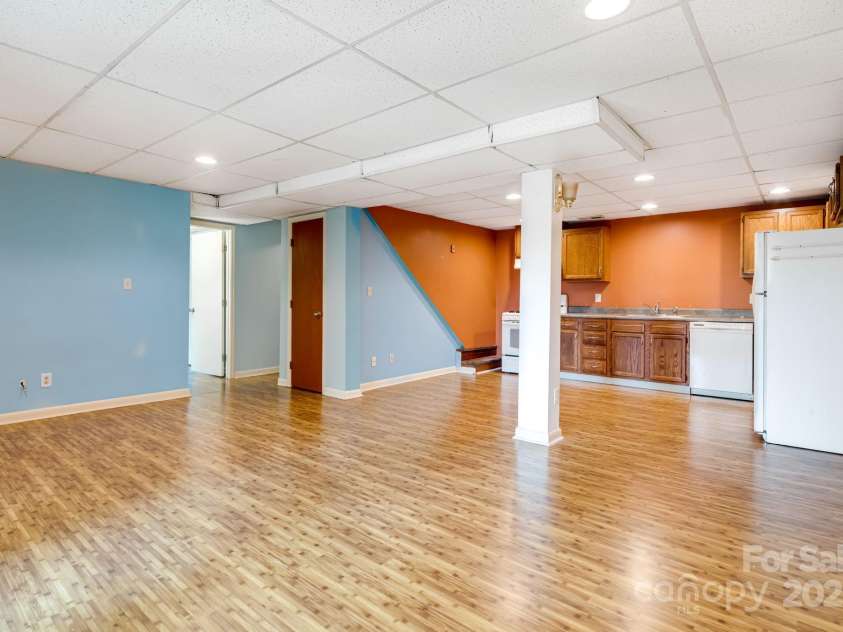 1360 Jupiter Road, Weaverville, NC 28787.  MLS# CAR4276296, YatesRealty ID 26556. Basement Apartment Open Kitchen and Living Space